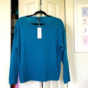 Never worn Eileen Fisher Bateau Neck top. Perfect condition. Kept hung in closet